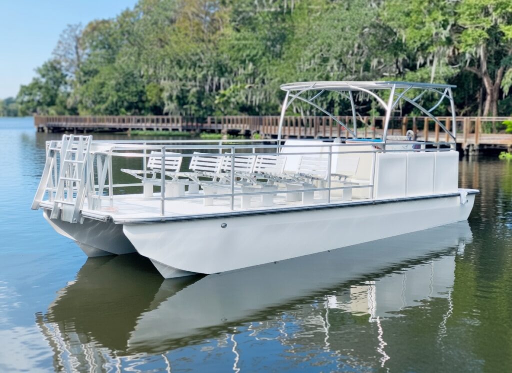 Beachcat Boats 2026 32-foot commercial saltwater pontoon boat configured with tiered tourist seating for sightseeing