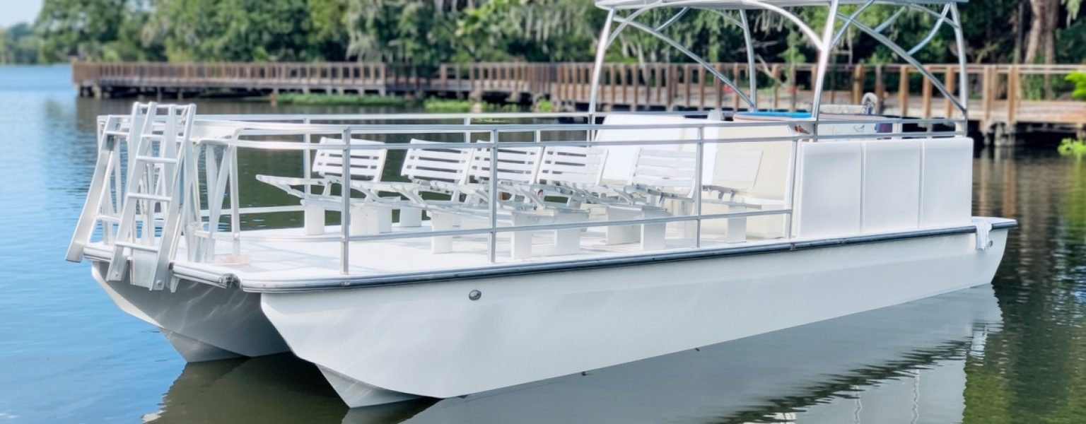 Beachcat Boats 2026 32-foot commercial saltwater pontoon boat configured with tiered tourist seating for sightseeing